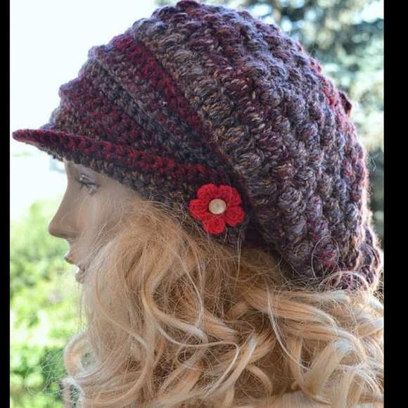 Noracora Accessories - NWT BOHO Knitted hat with a knitted flower .